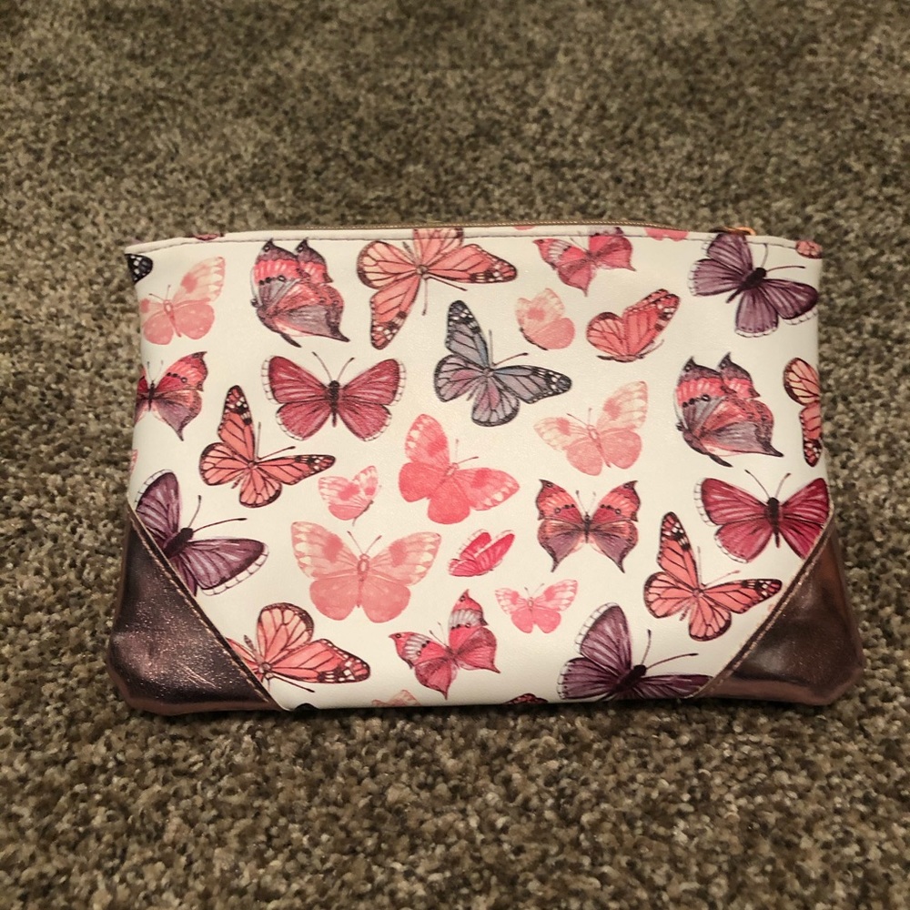 Butterfly cosmetic clutch
